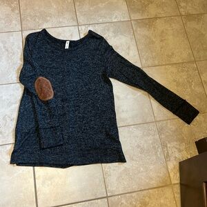 Women’s top, size medium.